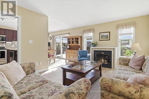 Sunlight from Several South Facing Windows - 25 Apple Tree Crescent, Uxbridge, ON - Indoor Photo Showing Living Room With Fireplace