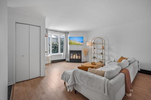 Living room - 1391 Rue Lajoie, Longueuil (Le Vieux-Longueuil), QC - Indoor Photo Showing Living Room With Fireplace