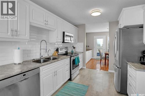72 Kensington Crescent, Regina, SK - Indoor Photo Showing Kitchen With Double Sink With Upgraded Kitchen