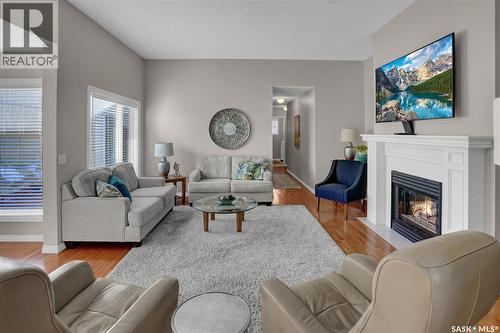 72 Kensington Crescent, Regina, SK - Indoor Photo Showing Living Room With Fireplace