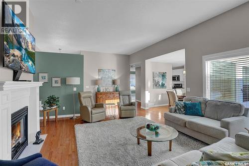 72 Kensington Crescent, Regina, SK - Indoor Photo Showing Living Room With Fireplace