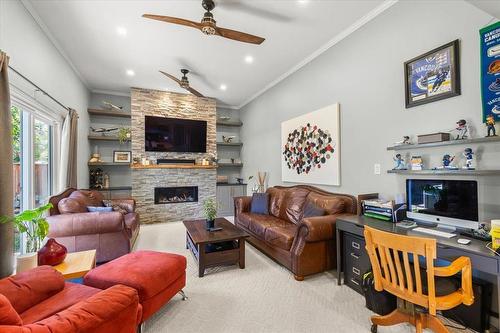 39 Erlandson Drive, Winnipeg, MB - Indoor Photo Showing Living Room With Fireplace