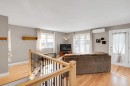 Salon - 202 Rue Des Pins, Prévost, QC  - Indoor Photo Showing Other Room With Fireplace 