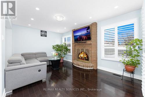 161 Hupfield Trail, Toronto, ON - Indoor Photo Showing Living Room With Fireplace