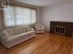 Living room with original hardwood floors - 