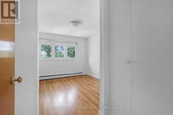 Bedroom nr 1 -Office/Den with original hardwood - 