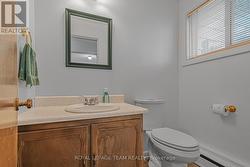 Powder room on lower level - 