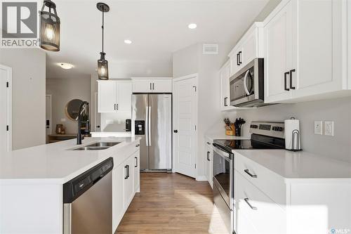251 Labine Bend, Saskatoon, SK - Indoor Photo Showing Kitchen With Stainless Steel Kitchen With Double Sink With Upgraded Kitchen