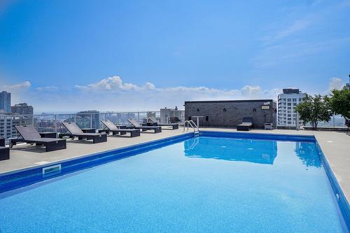 Pool - 437-1414 Rue Chomedey, Montréal (Ville-Marie), QC - Outdoor With In Ground Pool