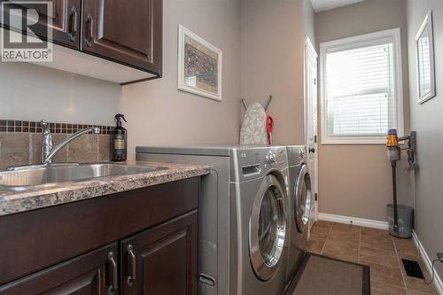 15 Volk Place, Red Deer, AB - Indoor Photo Showing Laundry Room