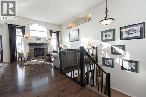15 Volk Place, Red Deer, AB - Indoor With Fireplace