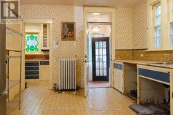 Mud room off kitchen, to side entrance & driveway - 