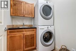 Main floor laundry with sink - 