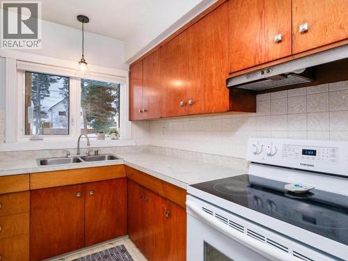 6 Tatchun Road, Whitehorse, YT - Indoor Photo Showing Kitchen With Double Sink