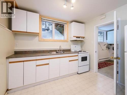 6 Tatchun Road, Whitehorse, YT - Indoor Photo Showing Kitchen With Double Sink