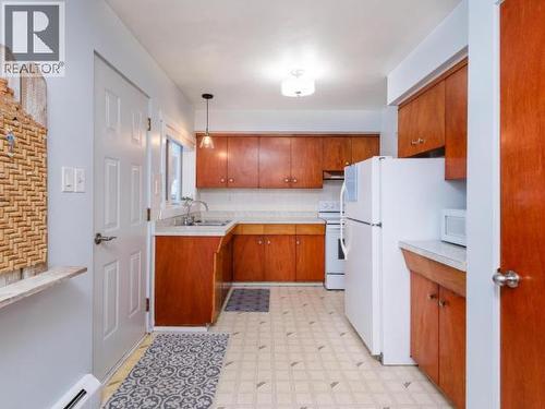 6 Tatchun Road, Whitehorse, YT - Indoor Photo Showing Kitchen