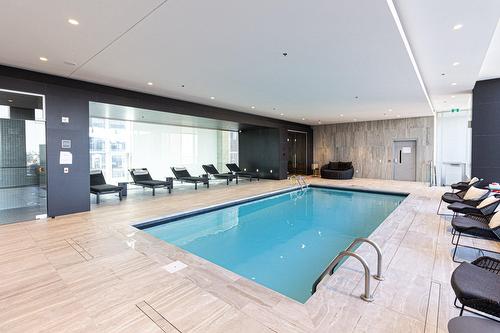Piscine - 1903-1500 Boul. René-Lévesque O., Montréal (Ville-Marie), QC - Indoor Photo Showing Other Room With In Ground Pool