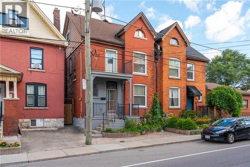 128 Hess Street N, Hamilton, ON - Outdoor With Balcony With Facade