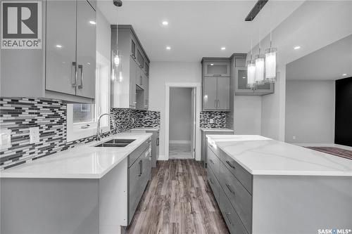 146 Sharma Lane, Saskatoon, SK - Indoor Photo Showing Kitchen With Double Sink With Upgraded Kitchen