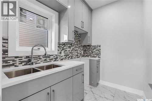 146 Sharma Lane, Saskatoon, SK - Indoor Photo Showing Kitchen With Double Sink With Upgraded Kitchen