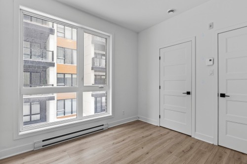 Chambre à coucher - 201-13225 Boul. Du Curé-Labelle, Mirabel, QC - Indoor Photo Showing Other Room