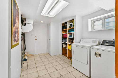 Salle de lavage - 52 Place Jasper, Candiac, QC - Indoor Photo Showing Laundry Room