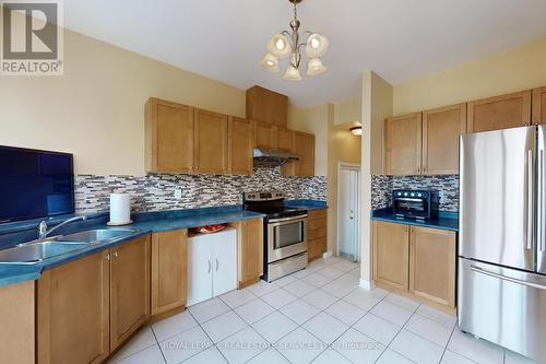 65 Ashdale Road, Brampton, ON - Indoor Photo Showing Kitchen With Double Sink