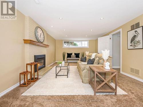 437 Highside Drive, Milton, ON - Indoor Photo Showing Living Room With Fireplace
