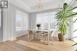 Open dining area with recessed ceiling - 