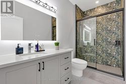 Main bathrm, exotic tile & body-spa showerhead - 