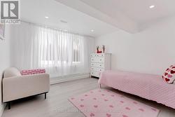 Lower level, home's 5th bedroom - 