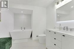 Lower level bathroom quartz variety & soaker tub - 