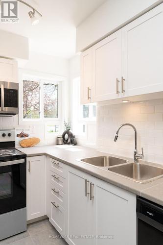 B7 - 240 Ormond Drive, Oshawa, ON - Indoor Photo Showing Kitchen With Double Sink