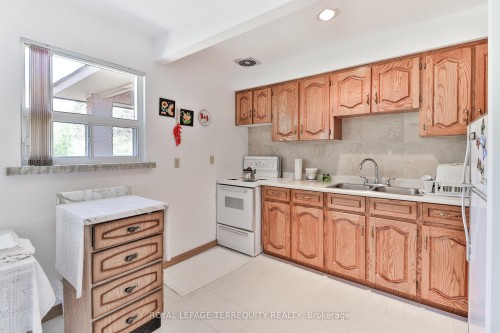 46 Stocco Circle, Tiny, ON - Indoor Photo Showing Kitchen With Double Sink