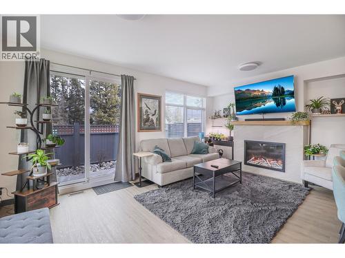 703 15A Crescent Unit# 15, Invermere, BC - Indoor Photo Showing Living Room With Fireplace
