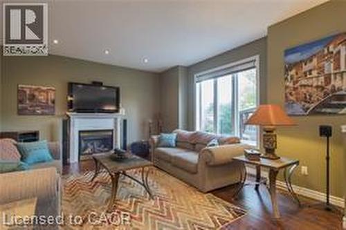 126 Falconridge Drive, Kitchener, ON - Indoor Photo Showing Living Room With Fireplace