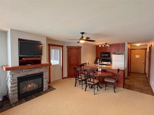 115-4559 Timberline Crescent, Fernie, BC - Indoor Photo Showing Living Room With Fireplace