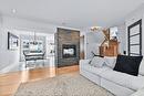 Salon - 20260 Rue De Nevers, Mirabel, QC  - Indoor Photo Showing Living Room With Fireplace 