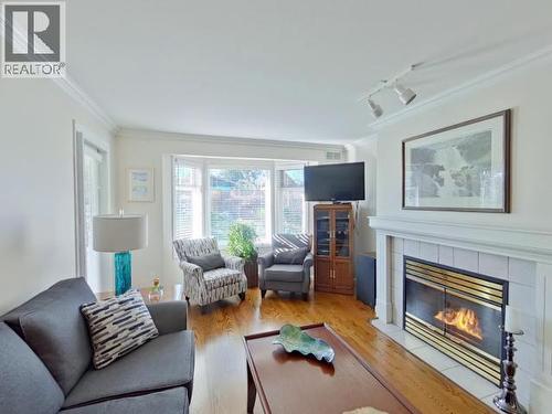 104-4685 Joyce Ave, Powell River, BC - Indoor Photo Showing Living Room With Fireplace