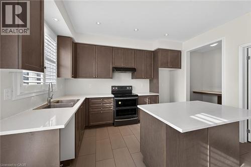 17 Larry Crescent, Caledonia, ON - Indoor Photo Showing Kitchen With Double Sink
