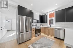 Kitchen, through to the mudroom at the back - 