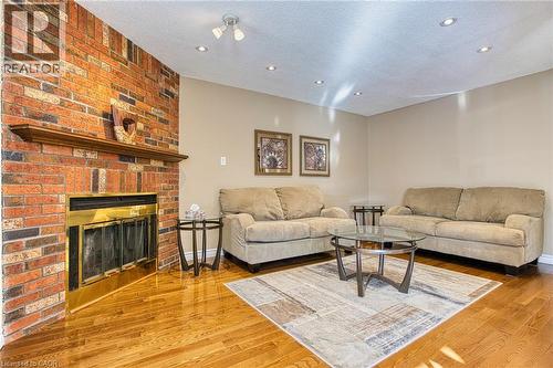 211 Rushdale Drive, Hamilton, ON - Indoor Photo Showing Living Room With Fireplace