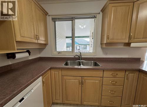 105 111 2Nd Avenue E, Rosetown, SK - Indoor Photo Showing Kitchen With Double Sink
