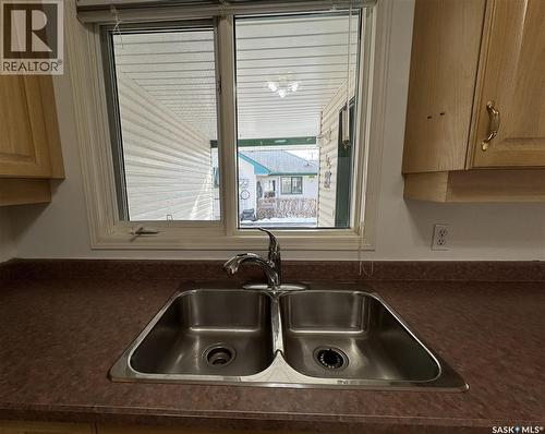 105 111 2Nd Avenue E, Rosetown, SK - Indoor Photo Showing Kitchen With Double Sink