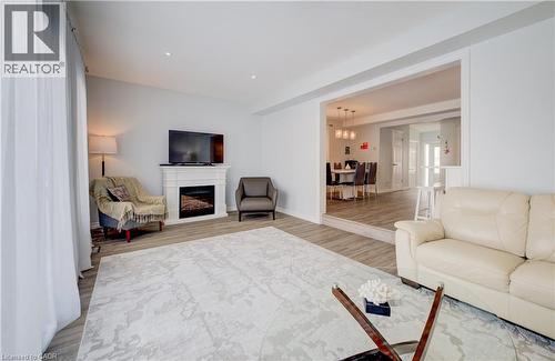 64 Hidden Creek Drive, Kitchener, ON - Indoor Photo Showing Living Room With Fireplace