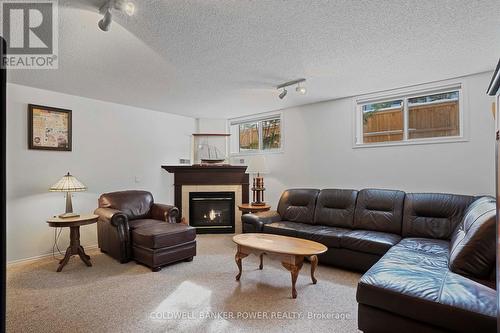 17 - 1337 Commissioners Road W, London South (South B), ON - Indoor Photo Showing Living Room With Fireplace