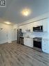 247 Northfield Drive E Unit# 406, Waterloo, ON  - Indoor Photo Showing Kitchen With Stainless Steel Kitchen 