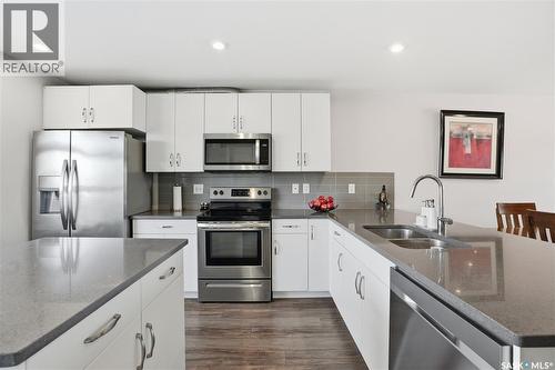 4174 Brighton Circle, Saskatoon, SK - Indoor Photo Showing Kitchen With Stainless Steel Kitchen With Double Sink With Upgraded Kitchen