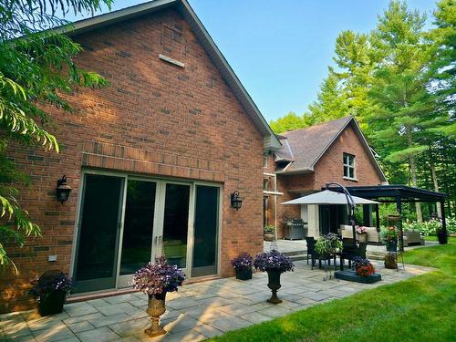 Face arrière - 19 Rue Raffles, Hudson, QC - Outdoor With Deck Patio Veranda