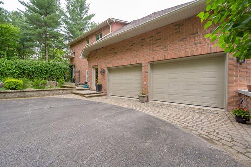 Garage - 19 Rue Raffles, Hudson, QC - Outdoor With Exterior